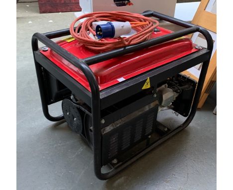 A petrol generator, little used, with instruction manual 