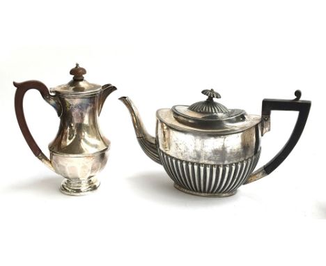 A silver coffee pot by Henry Clifford Davis, Birmingham 1931, 19cmH, 12.5oz; together with a plated teapot 