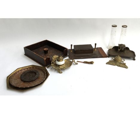 An Art Nouveau ink stand with ceramic inkwell; various other inkwells; leather desk tray; white metal topped spill vases, ope