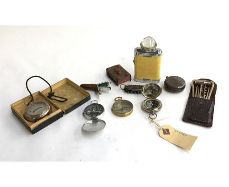 A mixed lot to include three compasses; bone pocket knife; small mother of pearl pocket knife in leather case; vintage volt m