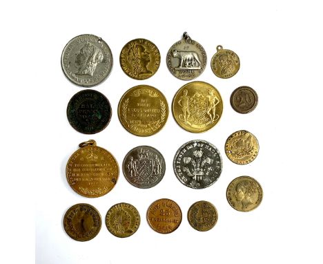 A small quantity of medals and tokens, to include one in memoriam of Queen Victoria; The Coronation of H.M King George V and 