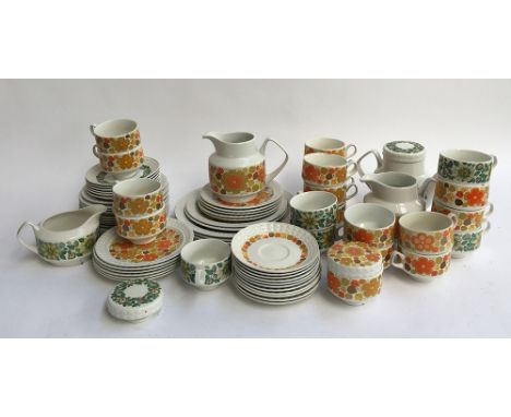 A collection of 1970s 'Pontesa Ironstone' tea wares, orange and green patterns, to include jugs, cups, saucers, sugar bowls e