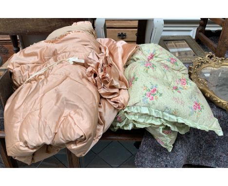 Two vintage eiderdowns and a satin sheet 