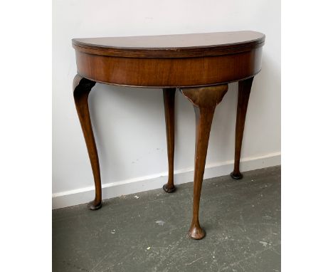 A burr walnut veneer demilune card table, with pull-out central cabriole, and green baize foldover top, 78cmW 