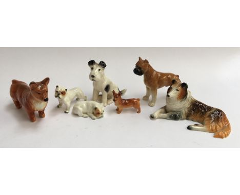 Two Goebel bulldog figurines; Royal Doulton Corgi; and various others (7) 