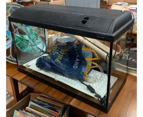 A Light Glo fish tank, 80x35cm; together with one other smaller, and a number of accessories 