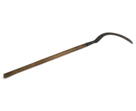 A vintage long handled sickle, approx. 128cmL 