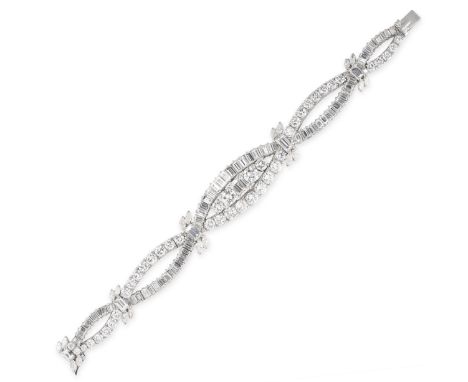 A VINTAGE DIAMOND TWISTED RIBBON STRAP BRACELET, 1960S Brilliant-cut, marquise-shaped and baguette diamonds, approximate tota