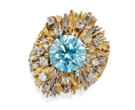 CHARLES DE TEMPLE, A VINTAGE BLUE ZIRCON AND DIAMOND COCKTAIL RING, 1967 Bicoloured textured design Circular-cut blue zircon,