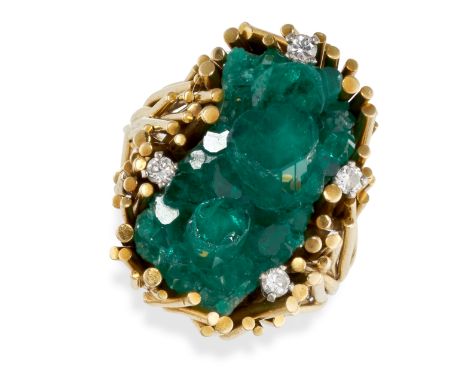 A VINTAGE MODERNIST SYNTHETIC EMERALD AND DIAMOND RING, 1966 Textured abstract mount composed of gold wirework Synthetic emer