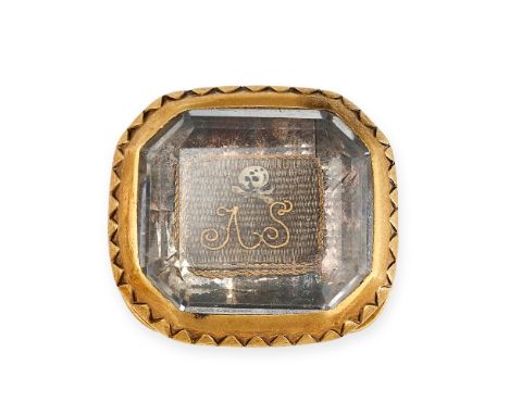 AN ANTIQUE STUART CRYSTAL HAIRWORK AND ENAMEL MOURNING SLIDE, 17TH CENTURY Faceted rock crystal oval hair work with skull mot