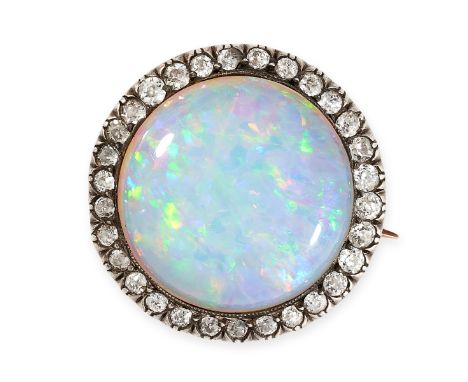 AN ANTIQUE OPAL AND DIAMOND BROOCH, 19TH CENTURY Cabochon opal, 18mm diameter Cushion-shaped diamonds, approximate total 0.80