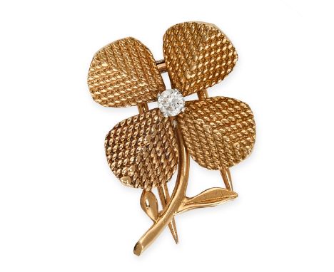STERLE, A VINTAGE DIAMOND FLOWER BROOCH, 1950SClip fitting, textured petals Brilliant cut diamond, approximately 0.10 carats 