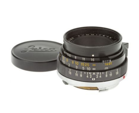 A Leitz Summicron f/2 35mm Lens, 1970, black, serial no. 2446109, body, VG, elements, VG-E, with maker's caps