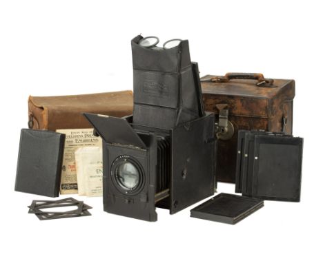 An Adams &amp; Co. Minex De Luxe Model Reflex Camera, 1910-50, black, serial no. 695, with Dallmeyer Pentac f/2.9 6" lens, ba