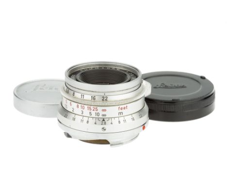 A Leitz Summaron f/2.8 35mm Lens, 1962, chrome, serial no. 1923900, body, G-VG, elements, VG, complete with maker's caps