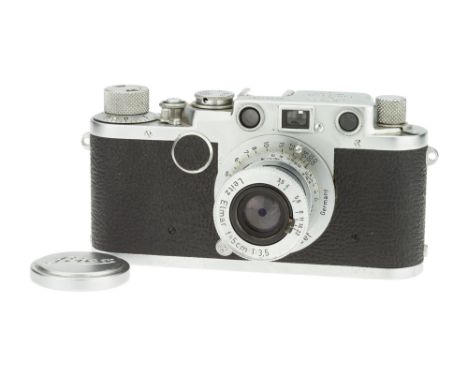 A Leica IIf Rangefinder Camera, 1951, chrome, serial no. 451487, with Leitz Elmar f/3.5 50mm lens, 1950, chrome, serial no. 8