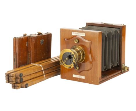 A J. Lancaster & Sons 'The Amateur Camera' Mahogany & Brass Quarter Plate Tailboard Camera, 1900, complete with J. Lancaster 