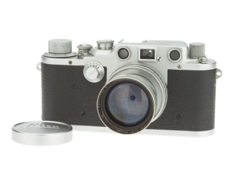 A Leica IIIc Luftwaffen-Eigentum Rangefinder Camera, 1940, chrome, serial no. 364207, with Leitz Summitar f/2 50mm lens, 1941