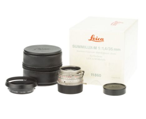 A Leitz Summilux-M f/1.4 35mm Lens, 1992, titanium, serial no. 3600279, body, VG, elements, VG, some very light internal haze