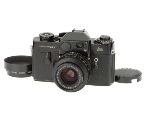 A Leica Leicaflex SLR Camera, 1964, black, serial no. 1084285, with Leitz Elmarit-R f/2.8 35mm lens, 1966, black, serial no. 