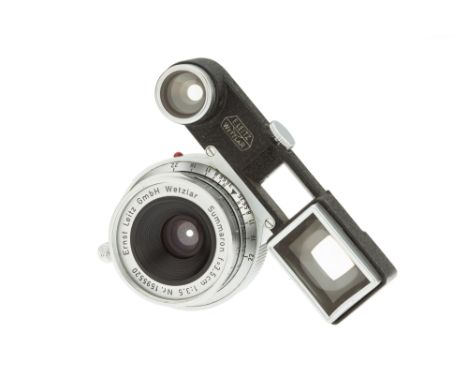 A Leitz Summaron f/3.5 35mm Lens, with ocular attachment, 1958, chrome, 1595520, body, VG, elements, VG, some light internal 