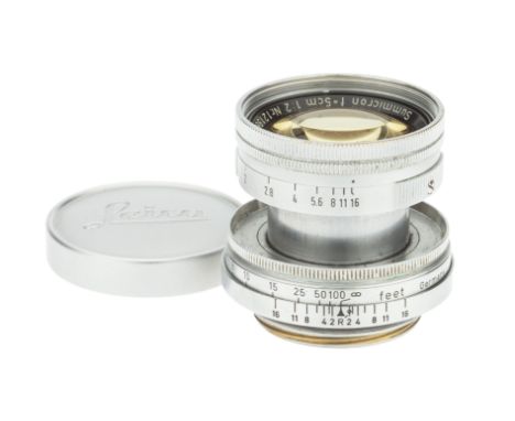 A Leitz Summicron 'Thorium' f/2 50mm Lens, 1954, chrome, serial no. 1219682, body, VG, elements, F-VG, some marks to the fron