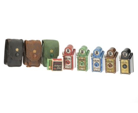 A Set of Coronet Midget Sub Miniature Cameras, 1935-36, including blue, red, green, brown and black examples, bodies overall,