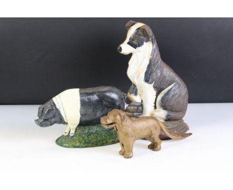 Cast iron saddleback pig &amp; collie doorstops, together with a vintage dog nutcracker 