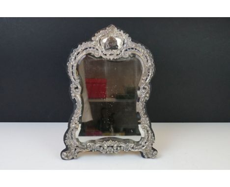 A fully hallmarked sterling silver easel backed table mirror, assay marked for Birmingham and dated for 1902. 