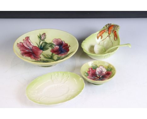 Moorcroft Pottery Bowl decorated in the Hibiscus pattern on a pale green ground, Walter Moorcroft paper label to base and blu