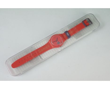 A cased Swatch London 2012 olympics quartz wristwatch. 