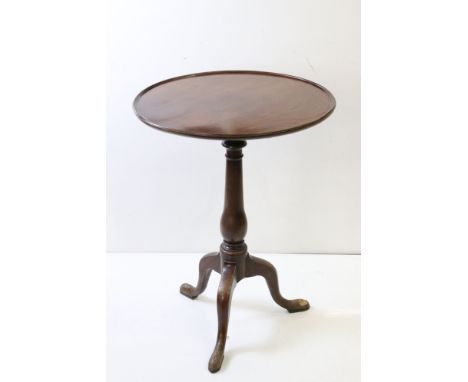 George III mahogany tripod table, one pad foot chewed, approx. 56cm diameter 