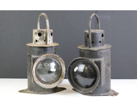 Two vintage railway lanterns to include a clear and red lens example. 