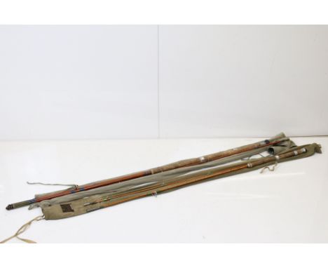 Two vintage split cane fishing rods in original rod bags to include a Hardy example 
