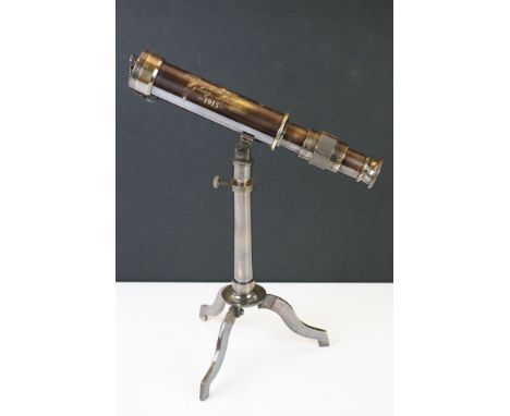 Brass cased telescope on tripod stand 