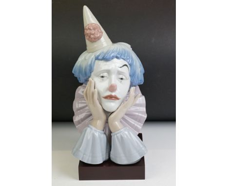 Lladro Jester bust figure, model no. 5129, 30.5cm high, raised on a wooden base 