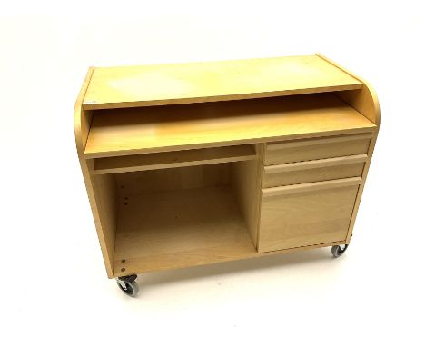 Light wood desk, fitted with three graduating drawers and desk slide, raised on castors Dimensions: Height:&nbsp;78cm&nbsp; L