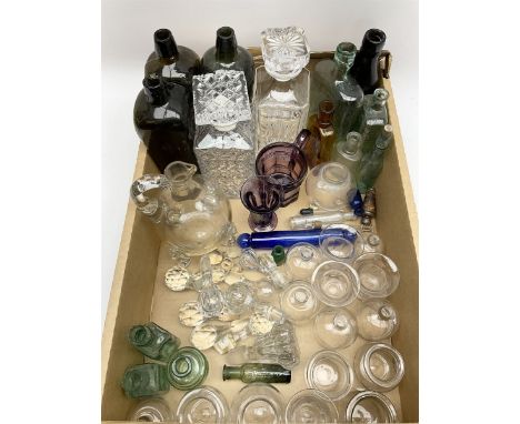 Quantity of glassware to include moulded faceted amethyst examples, rolling pin, bleeding cups, decanters and various stopper