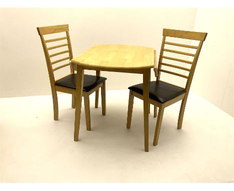 Circular light wood drop leaf dining table and two chairs