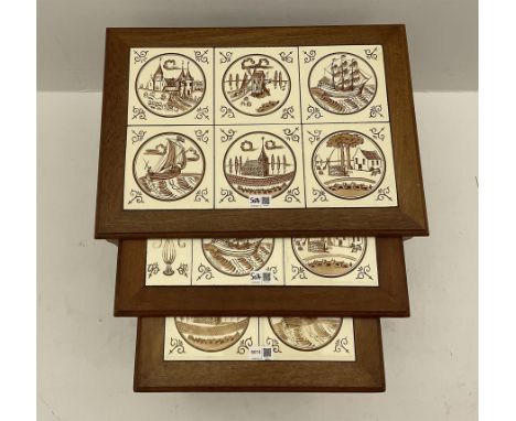 Nest of three tile topped occasional tables
