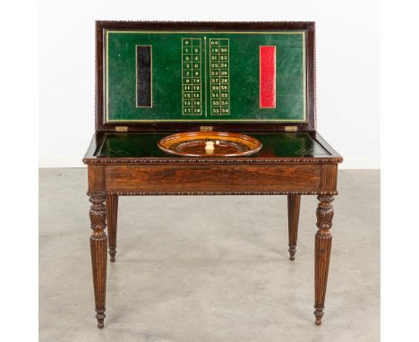 An antique game table with Roulette, Checkers, Chess and card-playing top. Rosewood inlaid with metal. 19th century.   (L: 46