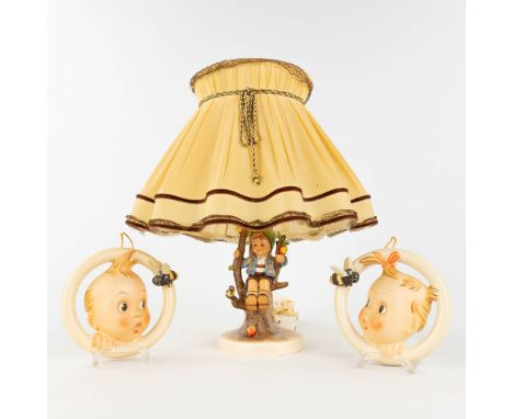 Hummel, a table lamp and 2 figurines.Dimensions without the lampshade.  (H: 26 cm)