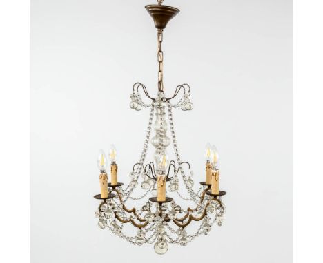 A hall lamp, bronze decorated with glass.19th century.The chandelier is an electrified candle chandelier.  (H: 60 x D: 50 cm)