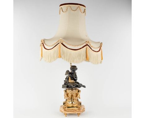 A table lamp with a reading angel figurine, bronze and onyx. The second half of the 20th century.  (L: 15 x W: 22 x H: 62 cm)