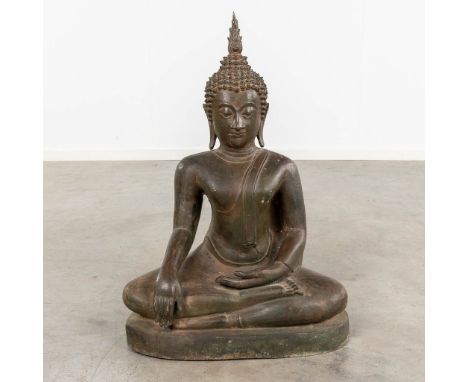 A large figurine of a seated buddha.Patinated bronze.Thailand, 19th century.  (L: 30 x W: 53 x H: 72 cm)