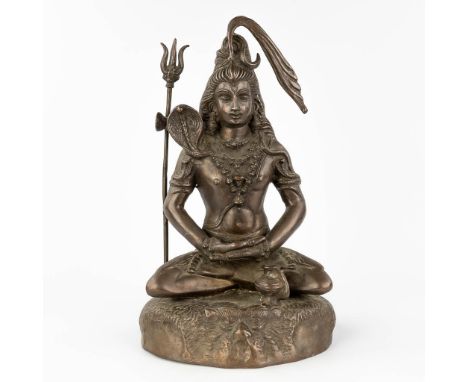 A Indian figurine of Shiva, bronze.  (L: 25 x W: 29 x H: 50 cm)