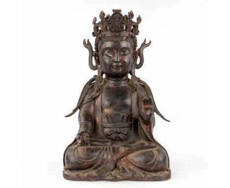 A Chinese figurine of Guanyin, bronze, 19th/20th century.  (L: 28 x W: 34 x H: 53 cm)