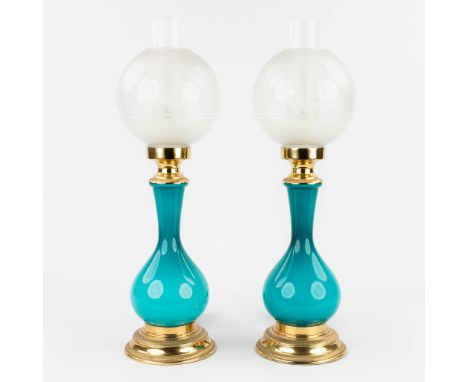 A pair of table lamps, opaline blue glass mounted with bronze. 20th century.  (H: 49 x D: 15 cm)