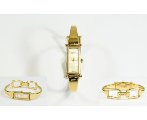 Gucci 1500 Ladies 18ct Gold Plated Wrist Watch with Mother of Pearl Dial. Model No YA0 15512, Features Sapphire Crystal, Swis